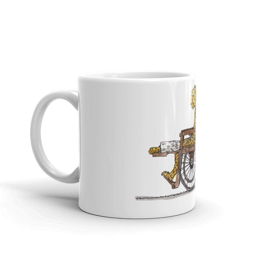 BellavanceInk: Injured Cheetah Strolling Along In His Wheelchair Limited Print On Coffee Mug - BellavanceInk